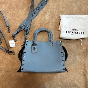 Coach Rogue 25 with rivets light blue